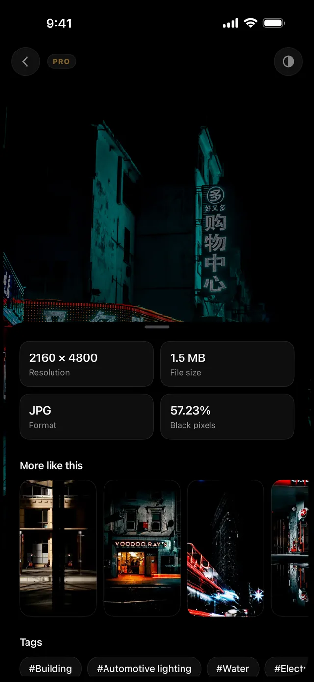 A wallpaper's detail screen in the app: 2160 by 4800, 1.5 MB, JPG, 57.23% black pixels, with lookalike wallpapers and tags below.